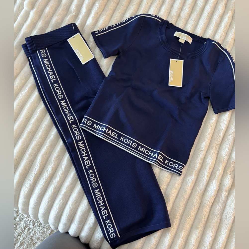 Never worn Women’s Michael Kors, two-piece shirt and skirt set